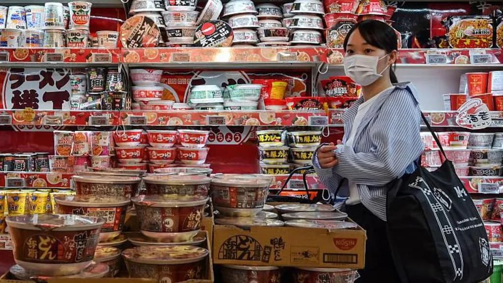 Bank of Japan raises rate to 1%, a 31-year high, and signals more hikes